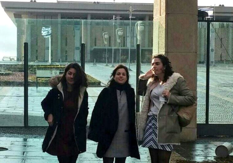 Knesset aides wear miniskirts in protest of Knesset dress code.