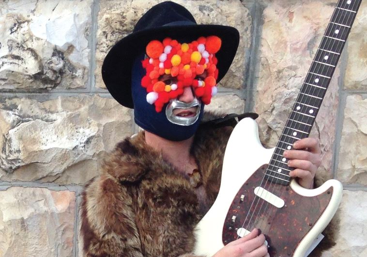 JERUSALEM MUSICIAN Eli Schabes wrestles with his music as the one-man looping band Maz Gan.