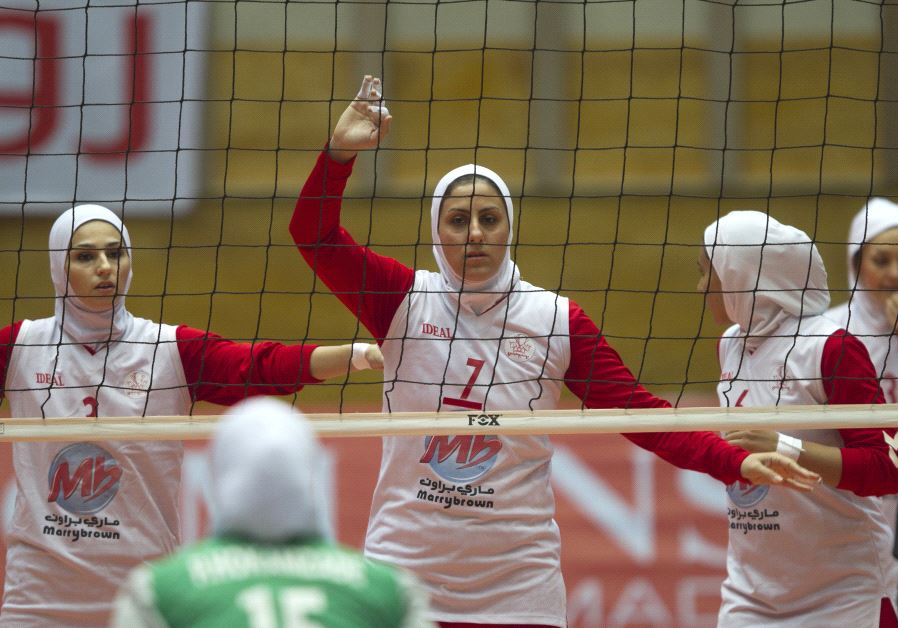 Iranian volleyball players Zeinab Giveh (L), Niloofar Rashidi (C) and Maryam Kamyabi in Tehran [File]