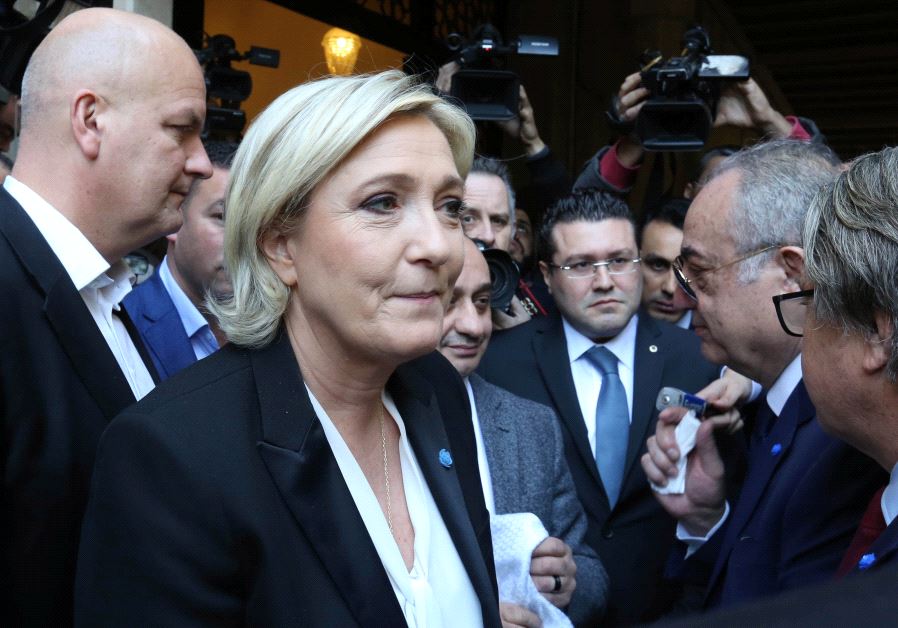 Marine Le Pen, French National Front (FN) political party leader and candidate for French 2017 presidential election, rejects a headscarf for her meeting Lebanon's Grand Mufti Sheikh Abed el-Lateef Daryan in Beirut, Lebanon February 21, 2017