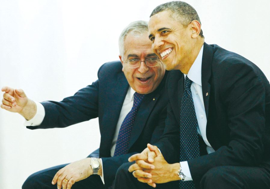 Then-US president Barack Obama watches a cultural event alongside then-Palestinian prime minister Salam Fayyad in Ramallah, 2013
