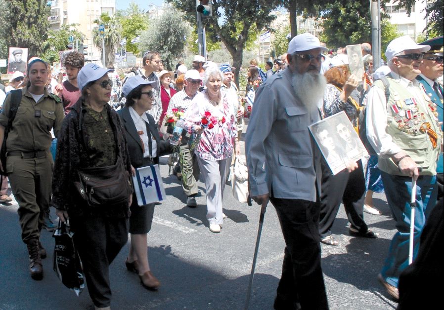 World War II veterans march down Jerusalem’s streets, together with IDF soldiers, at the Veterans’ Parade.