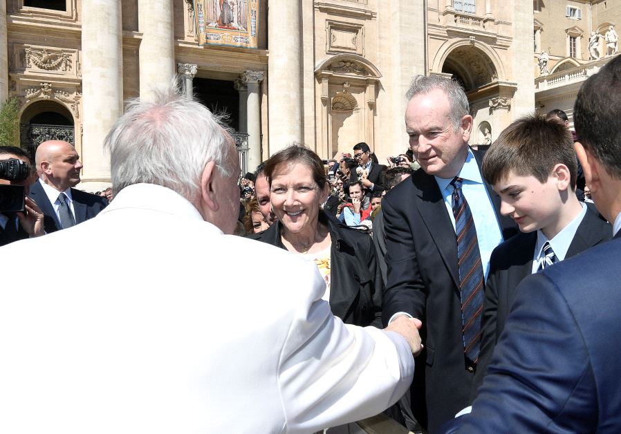 Fox News Channel host Bill O'Reilly shakes hand with Pope Francis during the Wednesday general audience in Saint Peter's square at the Vatican, April 19, 2017