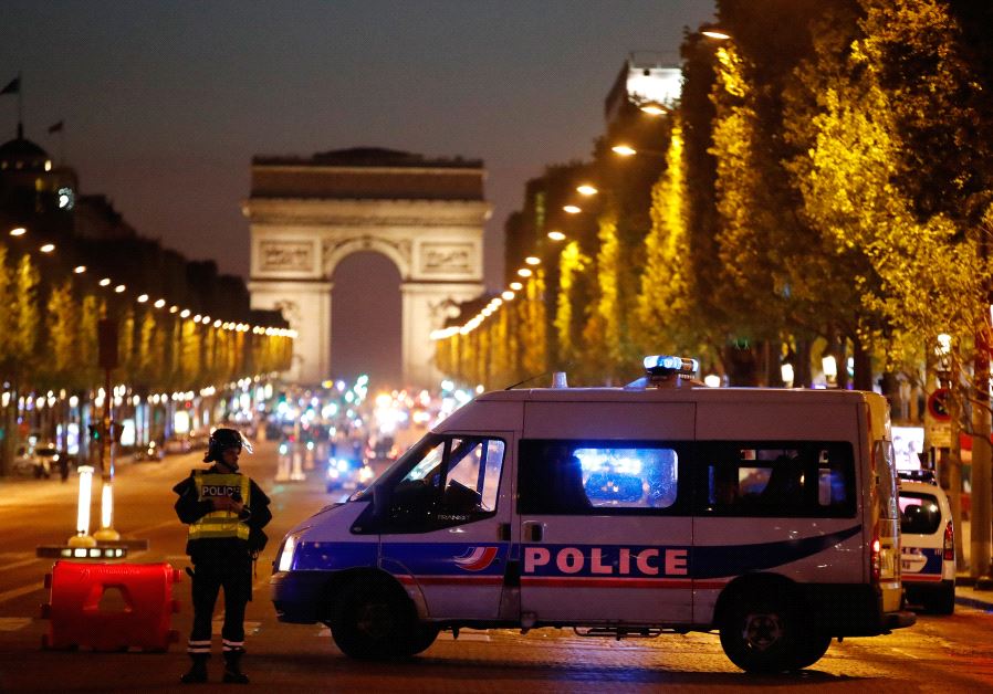Police secure the Champs Elysees Avenue after one policeman was killed and another wounded in a shooting incident in Paris, France, April 20, 2017