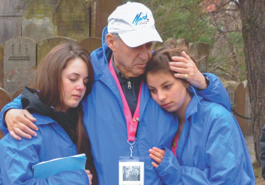 Suvivor Alex Buckman and two students on the 2010 March of the Living