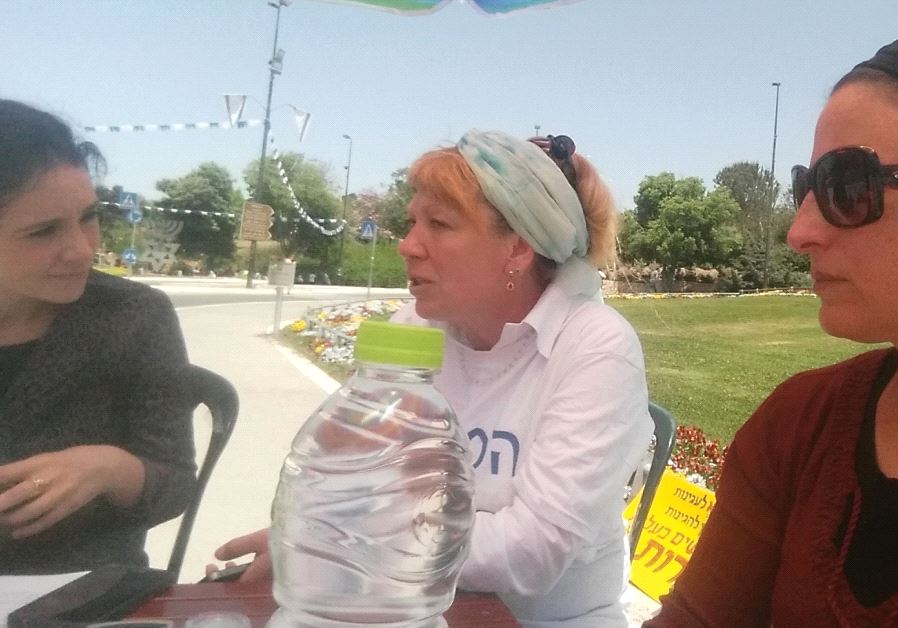 Tzviah Gordetski (center, outside the Knesset with supporters): ‘Why isn’t the State of Israel protecting me and providing me with the freedom I deserve?’ 