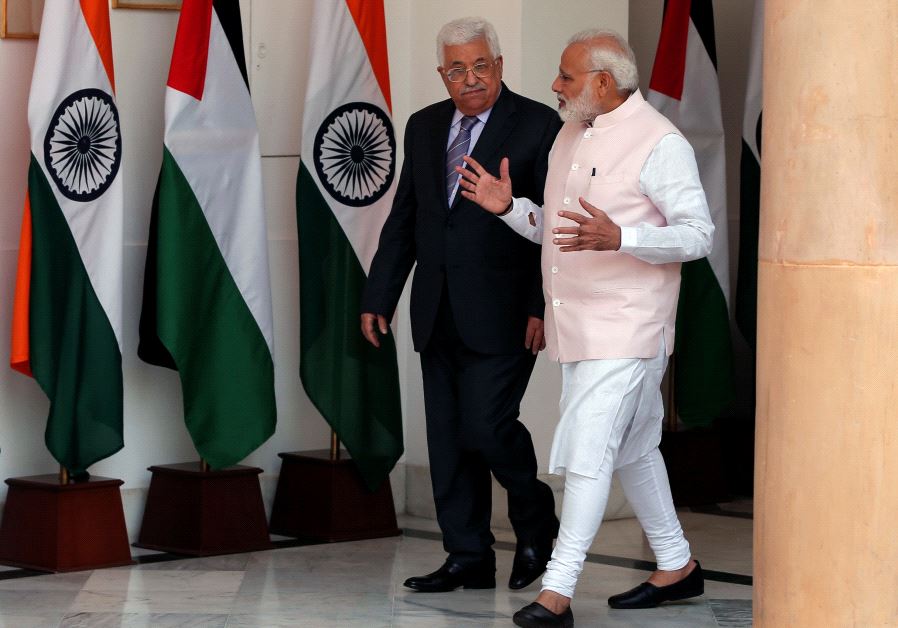 Palestinian Authority President Mahmoud Abbas (L) and India's Prime Minister Narendra Modi arrive for a photo opportunity, ahead of their meeting at Hyderabad House in New Delhi, India May 16, 2017