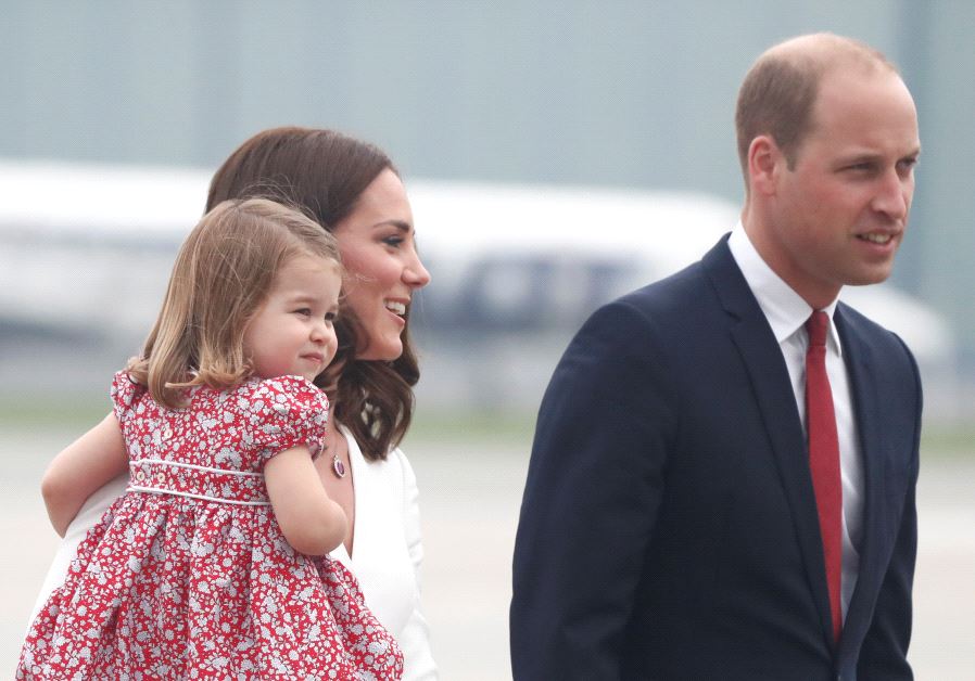 Prince William, the Duke of Cambridge, his wife Catherine, The Duchess of Cambridge and Princess Charlotte arrive at a military airport in Warsaw, Poland July 17, 2017